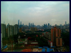 Guangzhou skyline from our hotel room at the Yutong Hotel. In the front is Tianhe district. To the right is Tianhe district's CBD, and to the left Zhujiang New Town. To the far left Canton Tower in Huzhou district can be seen. In the distance is Yuexiu and Liwan districts.